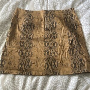 Snake skin short mini skirt.